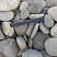 Kamenclub.ru: Галька речная плоская (серо-белая) фр. 70-120 мм. купить  в Новокузнецке галька галечник речной серый, белый окатанная плоская  природная галька 9000 руб/т   фото КАМЕНЬ КЛУБ